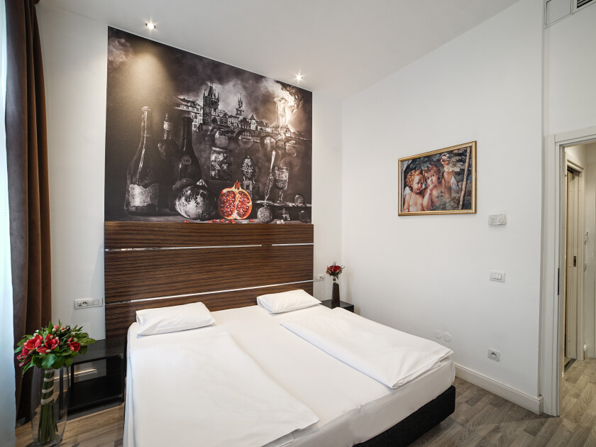 Doppel- oder Zweibettzimmer