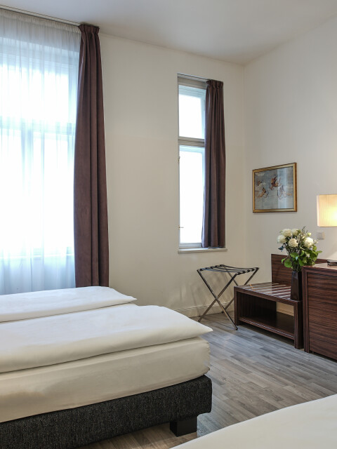 UNSERE ZIMMER UND SUITEN